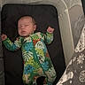 baby, baby_seat, babysuit, blanket, car_seat, child, closed_eyes, colorful_clothing, cozy, face, indoor, infant, jungle_pattern, newborn, onesie, photography, portrait, resting, safety_label, sleeping
