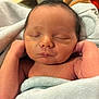 Silas is registered to the contest to win money with this photo: newborn, baby, sleeping, blanket, infant, face, peaceful, skin, soft, closeup, wrapped, child, cute, resting, portrait, young, human, peace, relaxation, fresh