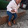 toddler, child, outdoor, sitting, wooden_step, jacket, leggings, boots, bottle, gravel, curious, person, young_child, casual_clothing, daylight, candid, portrait, small_object, natural_light, playful