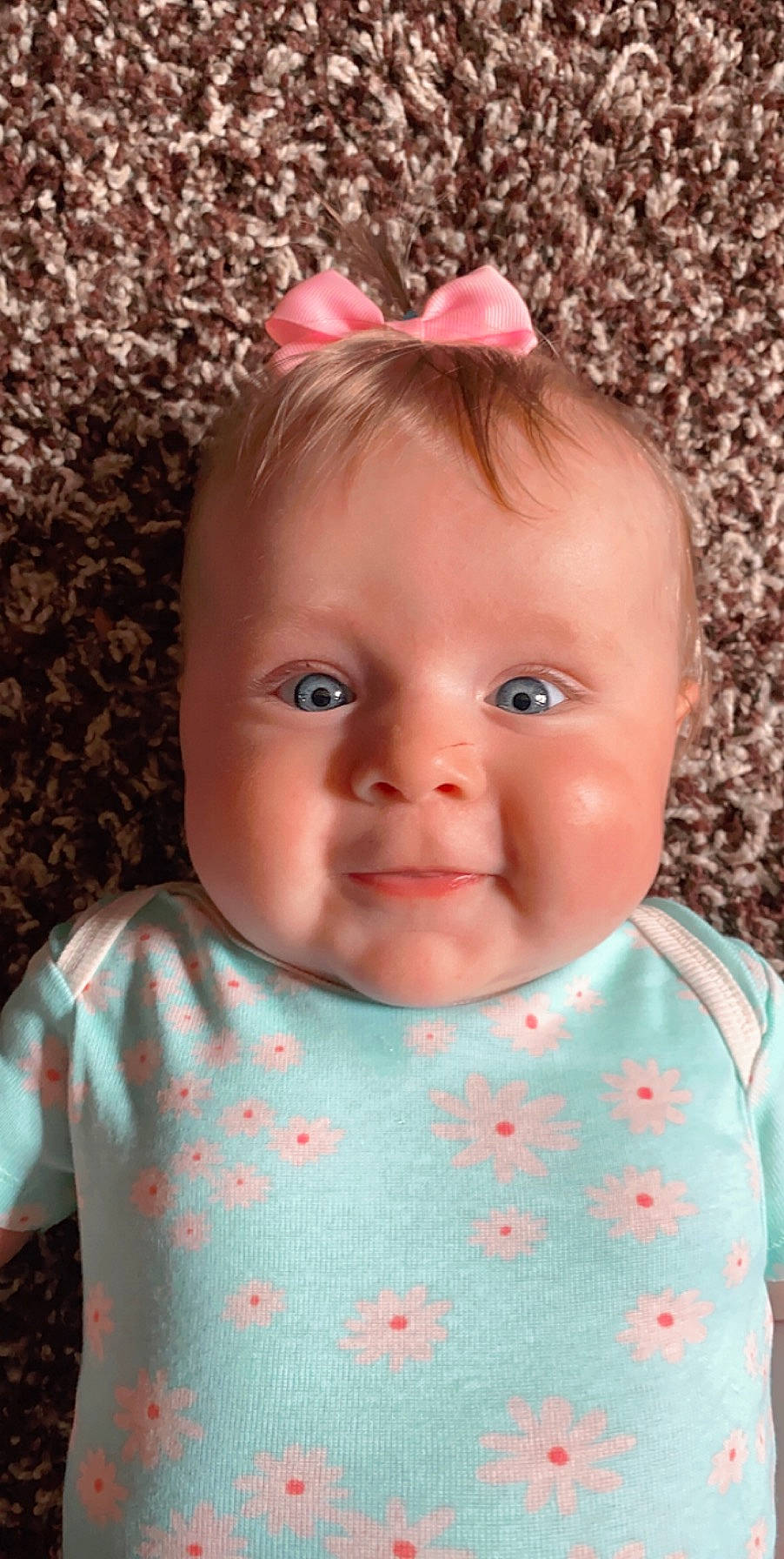 Rylee joined the competition — help win amazing prizes! baby, brown_hair, cheek, child, chin, eye, face, forehead, hair_accessory, head, iris, lip, nose, pattern, person, pink, skin, smile, toddler