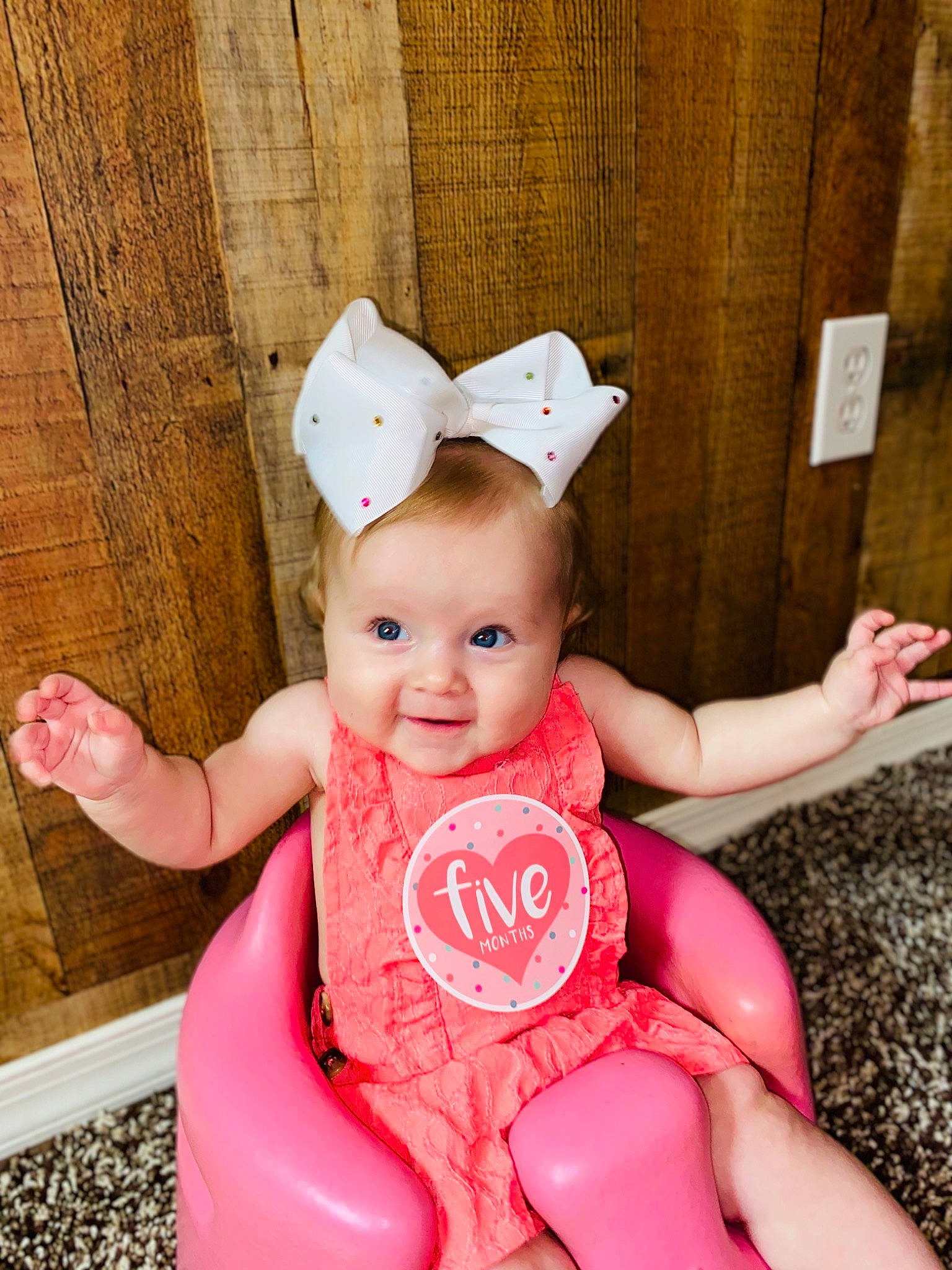 Rylee joined the competition — help win amazing prizes! baby, baby_toddler_clothing, beauty, child, child_model, ear, happy, headgear, person, pink, sitting, skin, smile, toddler