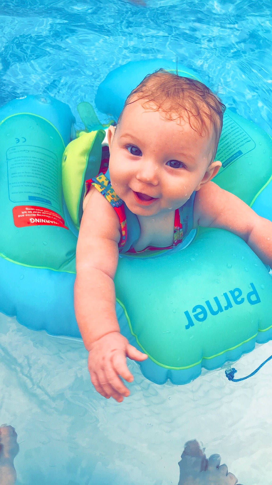 Chaya joined the competition — help win amazing prizes! aqua, azure, baby, baby_float, baby_toddler_clothing, bathing, blue, child, fun, games, happy, inflatable, leisure, outdoor_recreation, person, personal_protective_equipment, product, recreation, smile, toddler