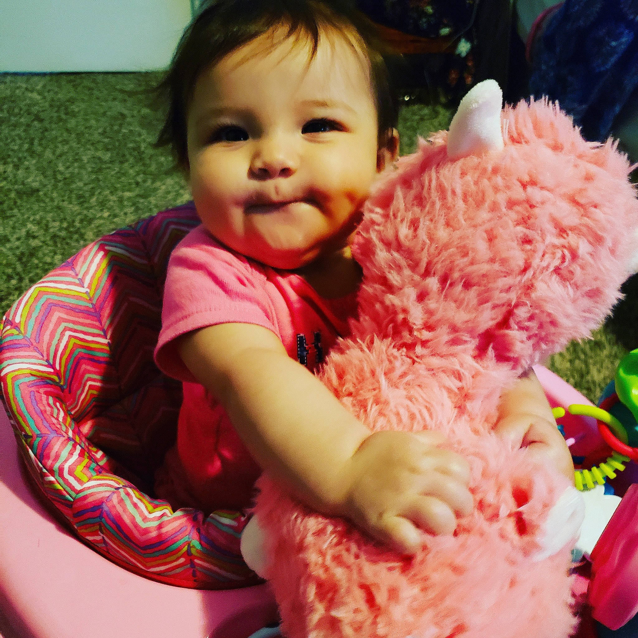 Lizzie is registered to the contest to win money with this photo: baby, beauty, cheek, child, dress, ear, eye, face, happy, head, nose, person, photography, pink, play, skin, smile, stuffed_toy, textile, toddler