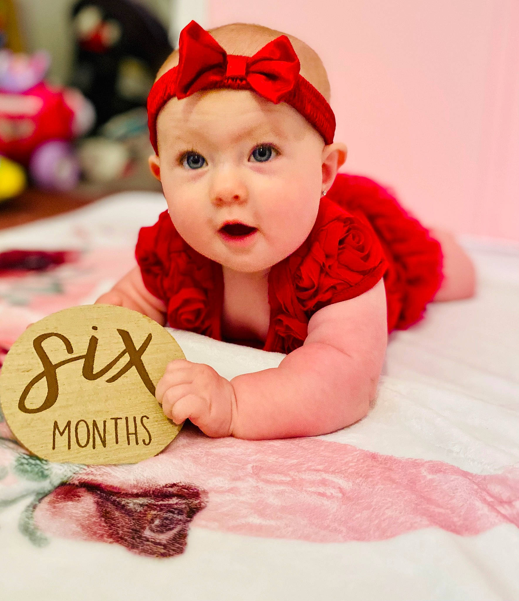 Dixie joined the competition — help win amazing prizes! baby, baby_toddler_clothing, cap, carmine, cheek, child, costume_hat, event, font, fun, happy, headwear, holiday, magenta, person, pink, portrait_photography, sitting, sleeve, smile