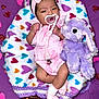 Jaslyn Cloe is registered to the contest to win money with this photo: baby, newborn, pacifier, headband_bow, blanket, heart_pattern, stuffed_animal, bunny, pink_clothing, purple_toy, onesie, sock, pacifier_clip, basket, cute, portrait, soft_texture, infant, closeup, sleepy