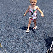 Violet-Jo joined the competition — help win amazing prizes! toddler, child, playground, swimsuit, blue_surface, outdoor, sunny, stroller, walking, tree, grass, sidewalk, car, shadow, summer, person, young_child, happy, playing, park