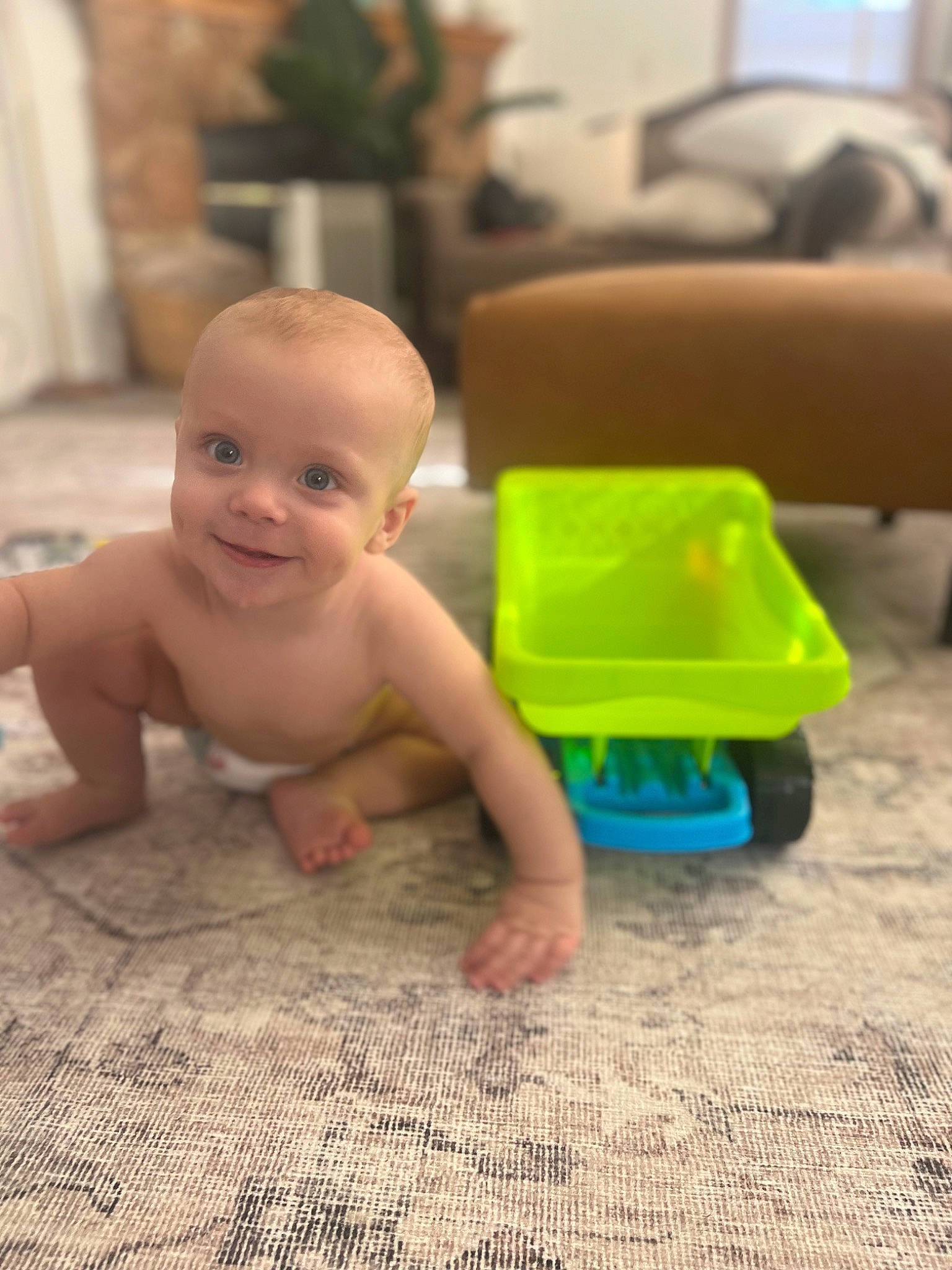 Jaylon joined the competition — help win amazing prizes! baby, cheek, child, crawling, floor, flooring, foot, fun, grass, happy, hardwood, houseplant, joy, person, product, room, sitting, skin, thumb, toddler