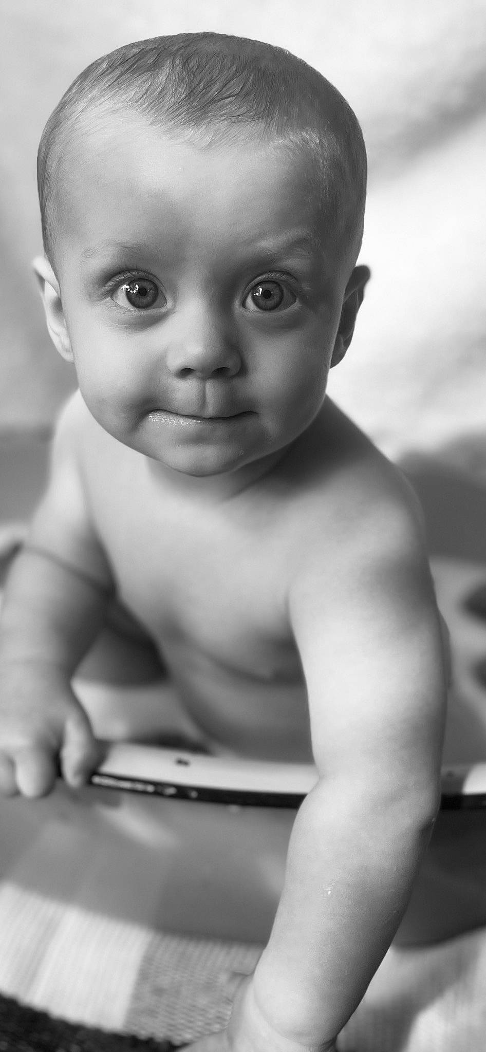 Jaylon is registered to the contest to win money with this photo: arm, baby, black, cheek, chest, eye, eyebrow, eyelash, finger, flash_photography, gesture, hand, happy, human_body, iris, lip, mouth, nose, person, skin