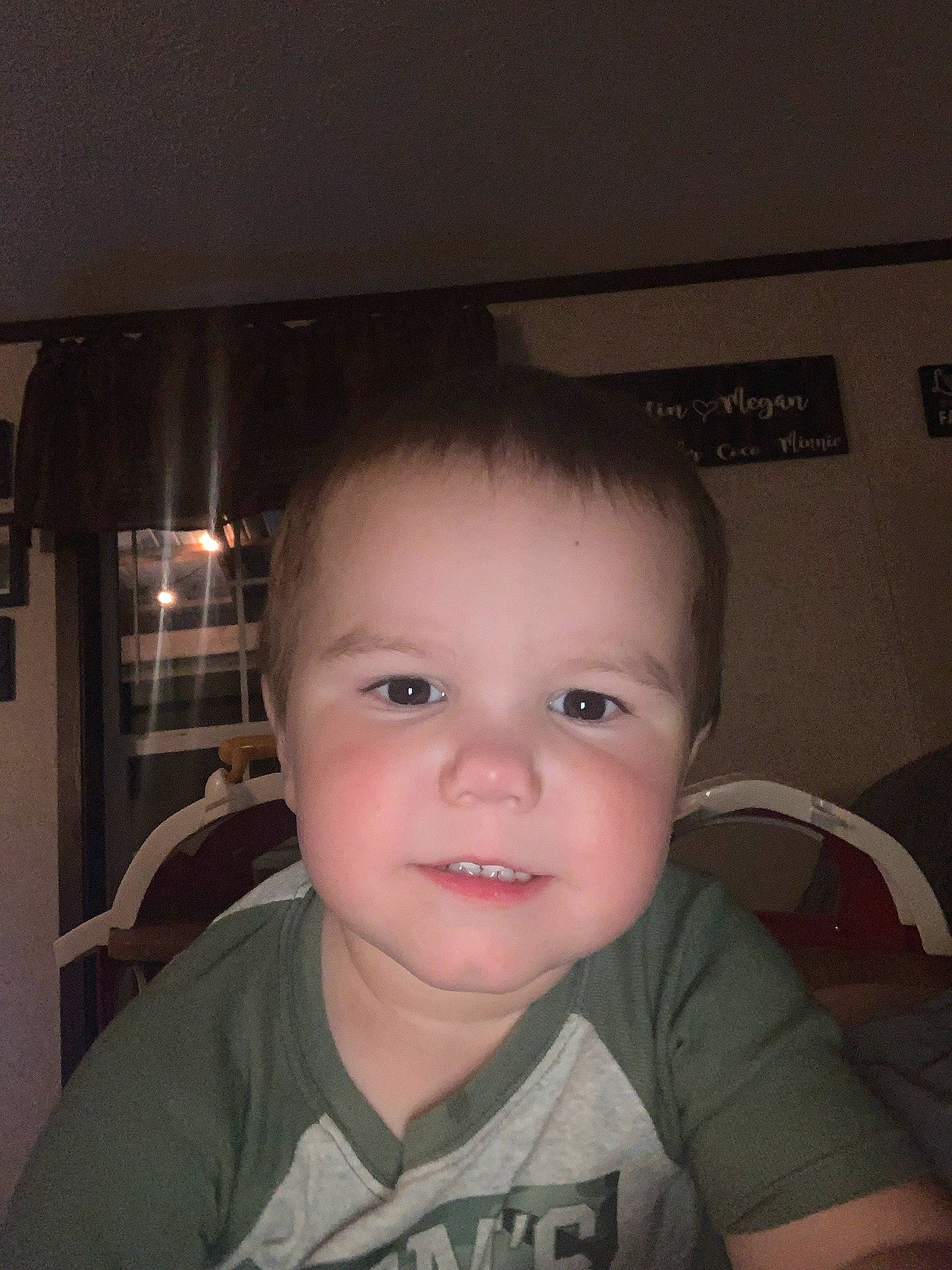 Vincent is registered to the contest to win money with this photo: baby, chair, cheek, chin, ear, eyebrow, eyelash, flash_photography, forehead, fun, iris, jaw, lip, mouth, neck, nose, person, skin, smile, t_shirt