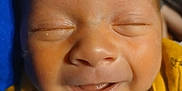 Westin joined the competition — help win amazing prizes! baby, newborn, smile, face, infant, blanket, cozy, closeup, child, sleeping, yellow_clothing, soft, cute, skin, mouth, head, peaceful, adorable, person, portrait