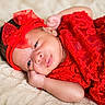 baby, infant, red_lace, headband, newborn, lying_down, blanket, soft_texture, cute, portrait, child, sleepwear, resting, closeup, adorable, peaceful, hand, face, skin, indoors