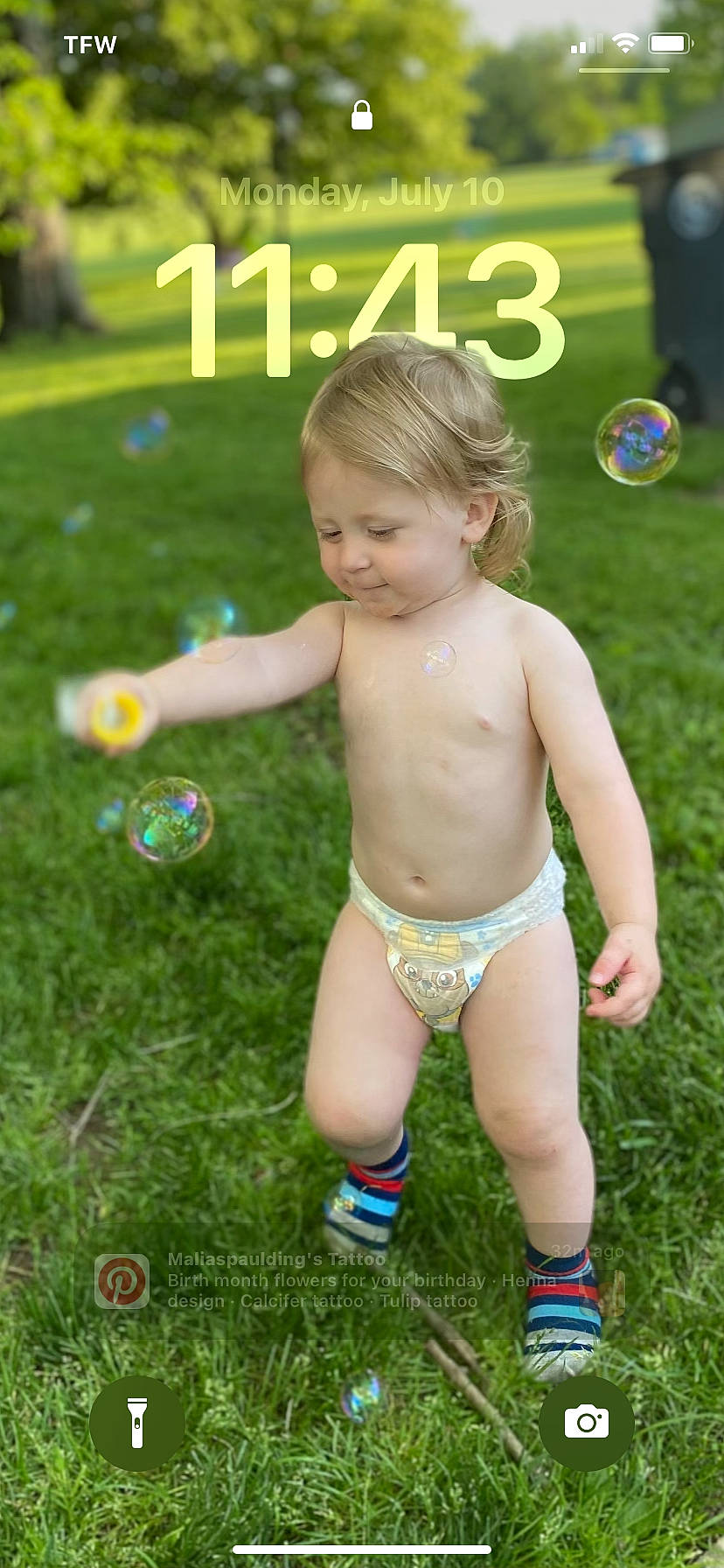 Mason is registered to the contest to win money with this photo: ball, chest, child, event, fun, grass, happy, lawn, leisure, nature, navel, people_in_nature, person, recreation, smile, summer, swimwear, thigh, toddler, trunk