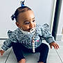 toddler, child, pacifier, hair_ties, sweater, pants, barefoot, floor, indoor, sitting, cute, baby, person, young_child, portrait, curious, skin, hair, clothing, feet