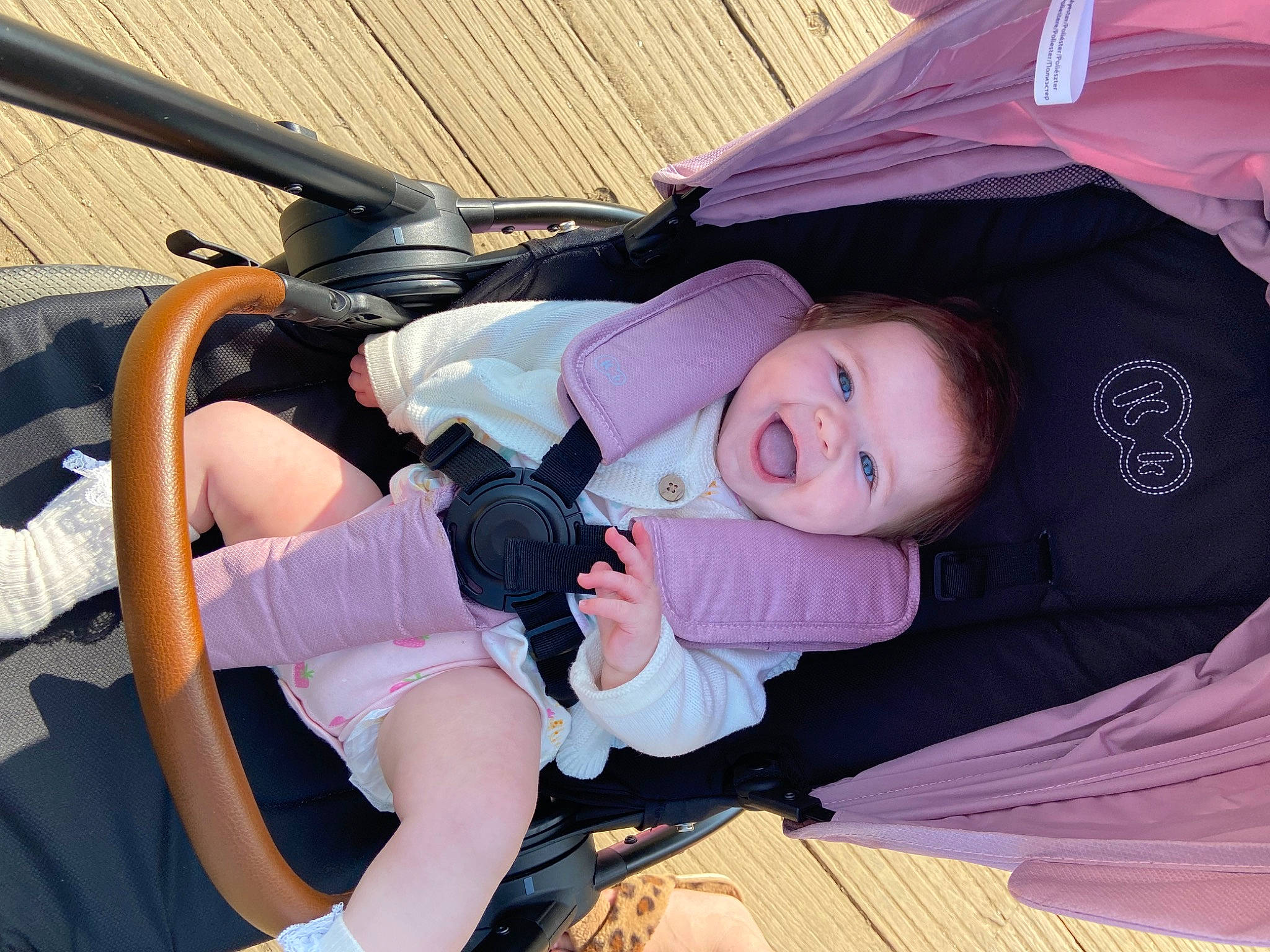 Mayah is registered to the contest to win money with this photo: auto_part, baby, baby_carriage, baby_products, car_seat, child, comfort, costume, fun, hat, lap, luxury_vehicle, motor_vehicle, person, personal_protective_equipment, pink, recreation, skin, smile, thigh