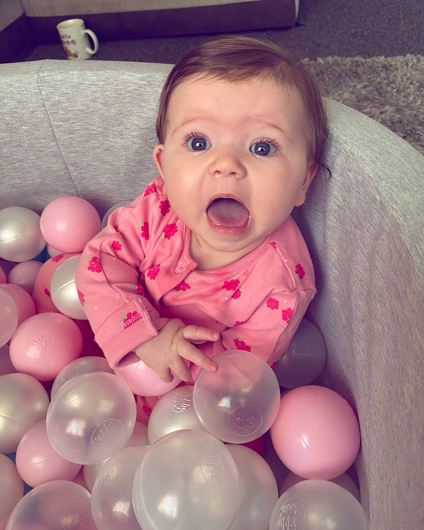 Mayah joined the competition — help win amazing prizes! baby, baby_toddler_clothing, balloon, cheek, face, facial_expression, hairstyle, happy, head, human_body, iris, mouth, nose, organ, person, pink, product, skin, sleeve, surprise