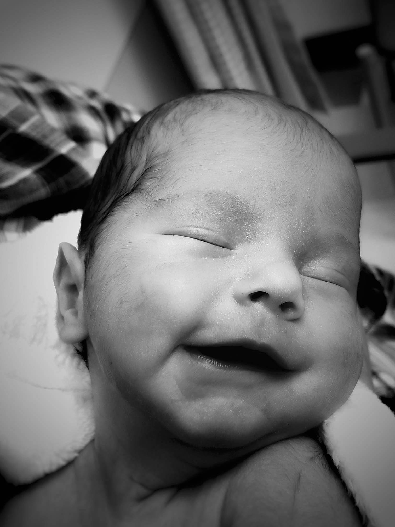 Jensen is registered to the contest to win money with this photo: beauty, black, black_and_white, cheek, child, chin, eye, eyebrow, face, facial_expression, forehead, infant, lip, monochrome_photography, nose, person, photograph, skin, smile, white