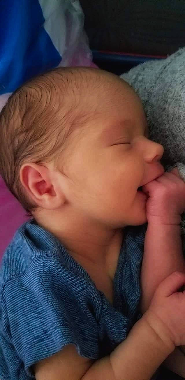 Jensen joined the competition — help win amazing prizes! cheek, child, chin, close_up, ear, eye, face, finger, forehead, hand, head, human_hair_color, infant, joy, lip, mouth, nap, nose, person, skin