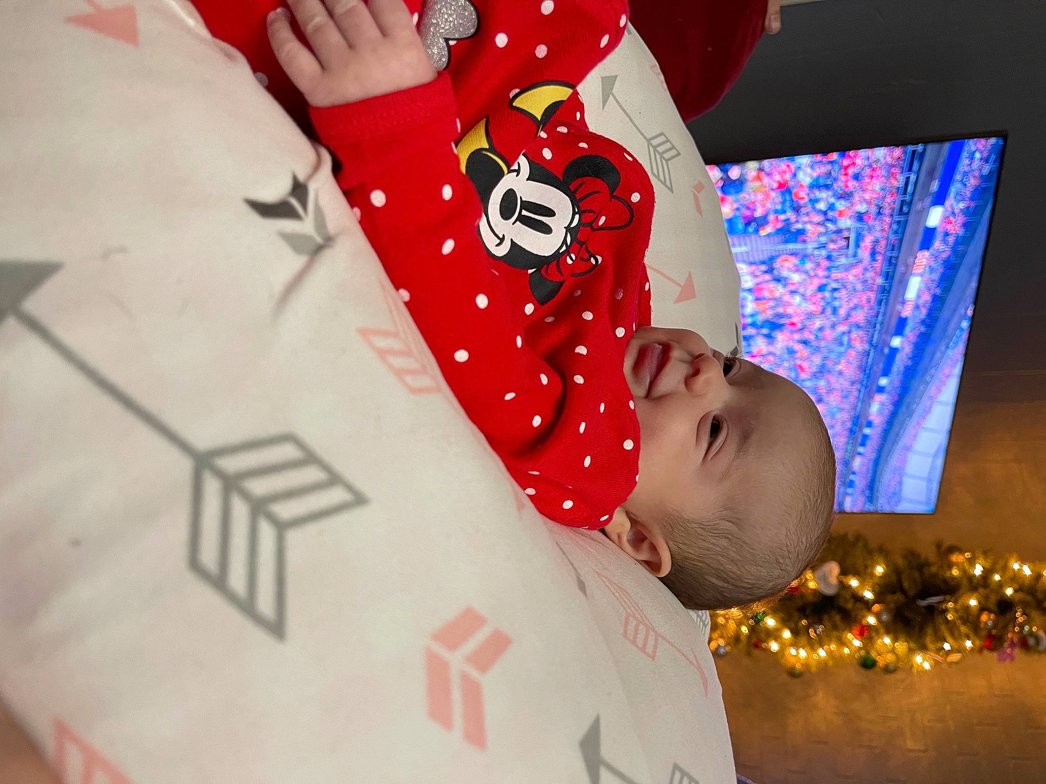 Caroline is registered to the contest to win money with this photo: baby, baby_toddler_clothing, carmine, child, christmas, christmas_eve, event, font, fun, happy, holiday, pattern, person, red, room, sleeve, smile, t_shirt, toddler, tree