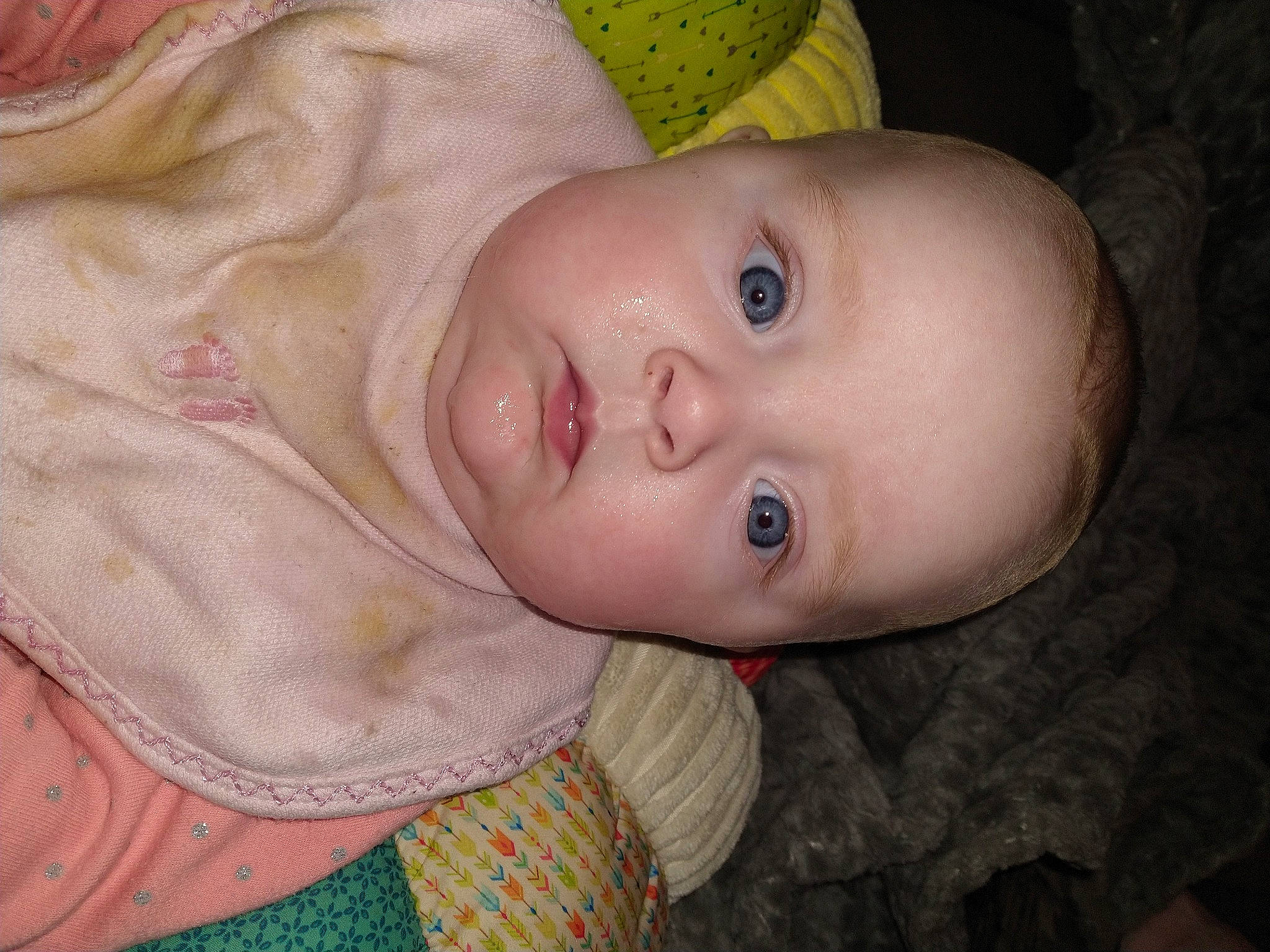 Mae is registered to the contest to win money with this photo: baby, baby_toddler_clothing, cheek, child, eye, eyebrow, eyelash, face, flash_photography, forehead, grass, head, human_body, iris, lip, nose, pattern, person, skin, toddler