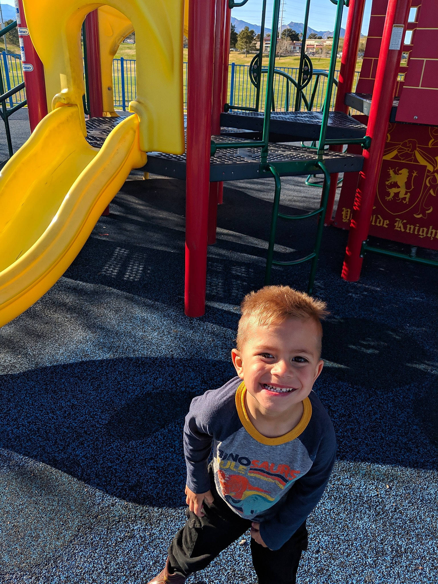 Zander joined the competition — help win amazing prizes! child, chute, city, fun, human_settlement, joy, leisure, outdoor_play_equipment, person, play, playground, playground_slide, public_space, recreation, red, sitting, smile, toddler, vacation, yellow