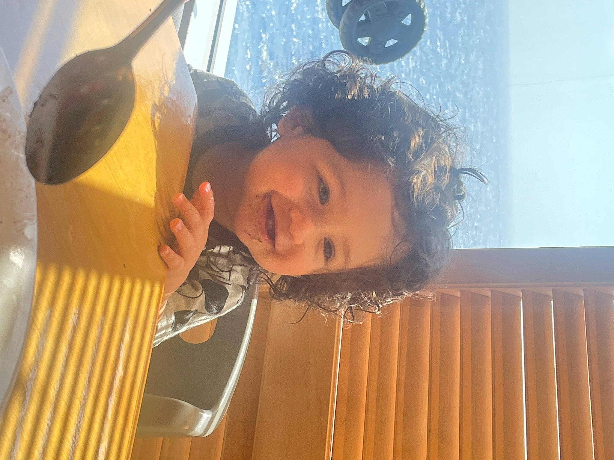 Juan is registered to the contest to win money with this photo: black_hair, child, eyewear, fun, happy, hat, joy, leisure, person, personal_protective_equipment, recreation, smile, toddler, travel, vacation, water, wood