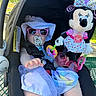 Elizabeth joined the competition — help win amazing prizes! baby, car_seat, sunglasses, hat, pacifier, plush_toy, minnie_mouse, tutu_skirt, outdoor, sunlight, child, toy, colorful_clothing, pink, seatbelt, infant, cute, summer, accessories, person