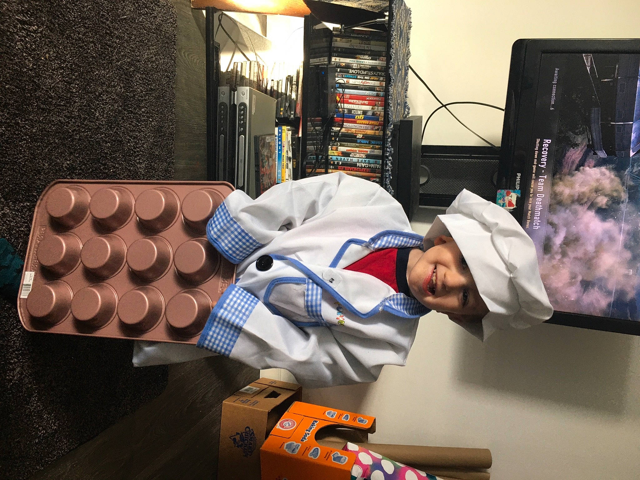 Justin is registered to the contest to win money with this photo: display_device, fictional_character, headwear, joy, led_backlit_lcd_display, person, space