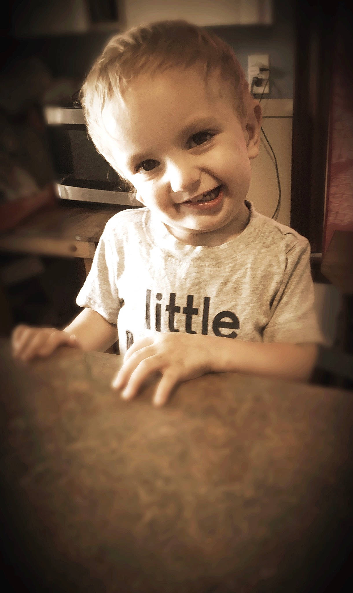 Justin is registered to the contest to win money with this photo: baby, cheek, child, chin, cool, eye, face, facial_expression, fun, hair, head, joy, nose, organ, people, person, photograph, skin, smile, snapshot