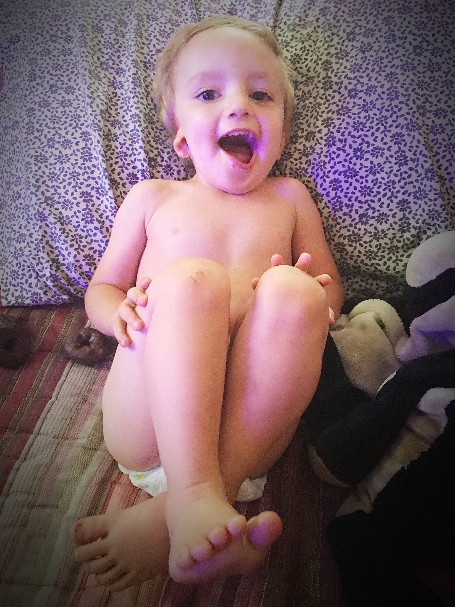 Justin joined the competition — help win amazing prizes! baby, barefoot, cheek, child, face, facial_expression, finger, foot, fun, hand, leg, person, pink, sitting, skin, smile, thumb, toddler