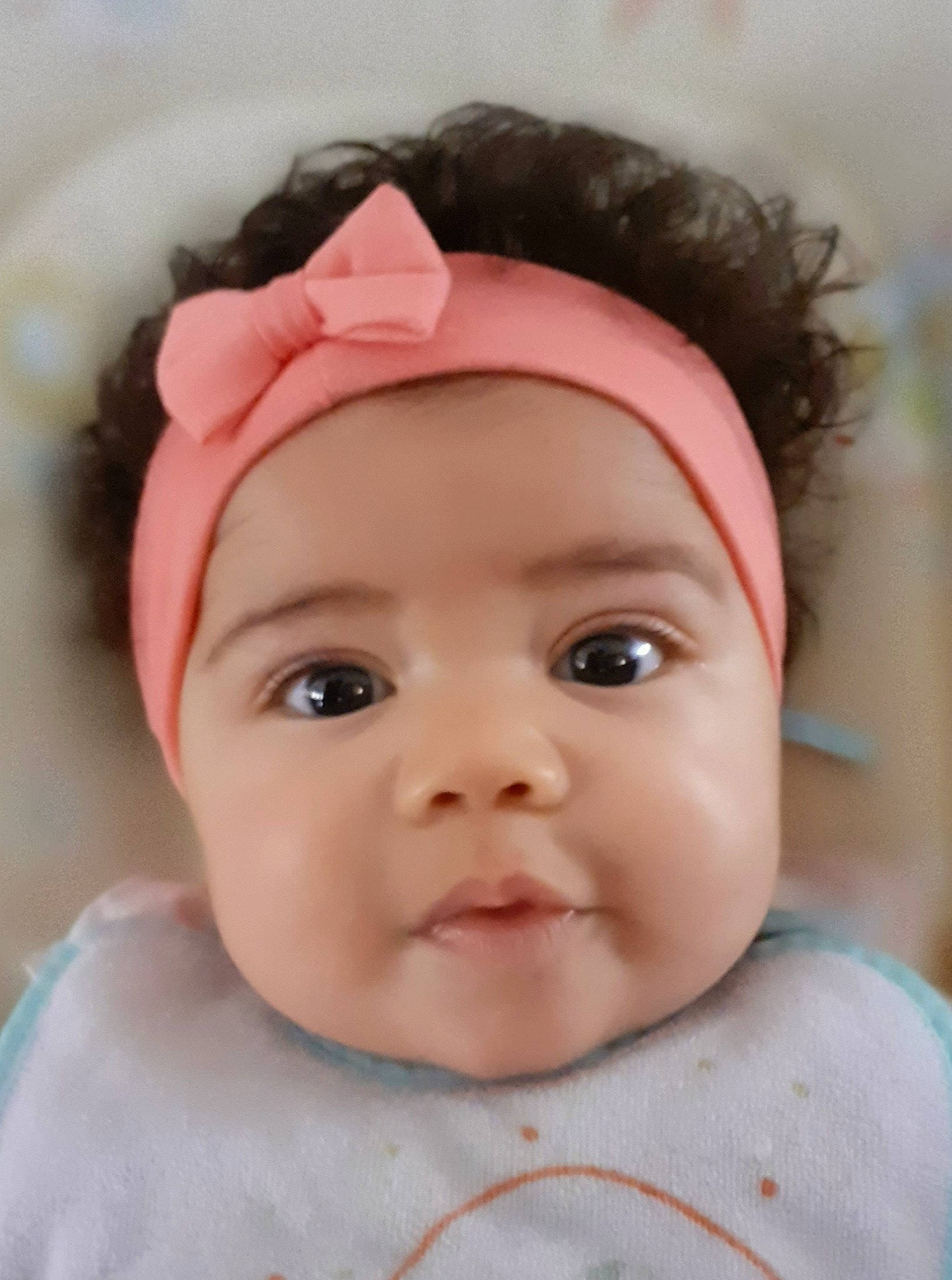 Mia participe au concours pour gagner de l'argent avec cette photo : baby, baby_toddler_clothing, cheek, child, ear, eye, eyelash, face, fashion_accessory, forehead, happy, headgear, headwear, iris, lip, neck, nose, person, skin, sleeve