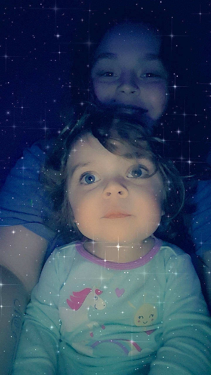 Kaelyn is registered to the contest to win money with this photo: baby, blue, cheek, child, eye, face, forehead, fun, head, iris, night, nose, person, photography, portrait, skin, sky, smile, space, toddler