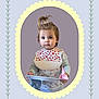 toddler, child, bib, plate, spoon, hair, pony_tail, heart_pattern, long_sleeve_shirt, cherry_pattern, portrait, indoor, cute, young_child, face, expression, holding, frame, decorative_border, pastel_colors