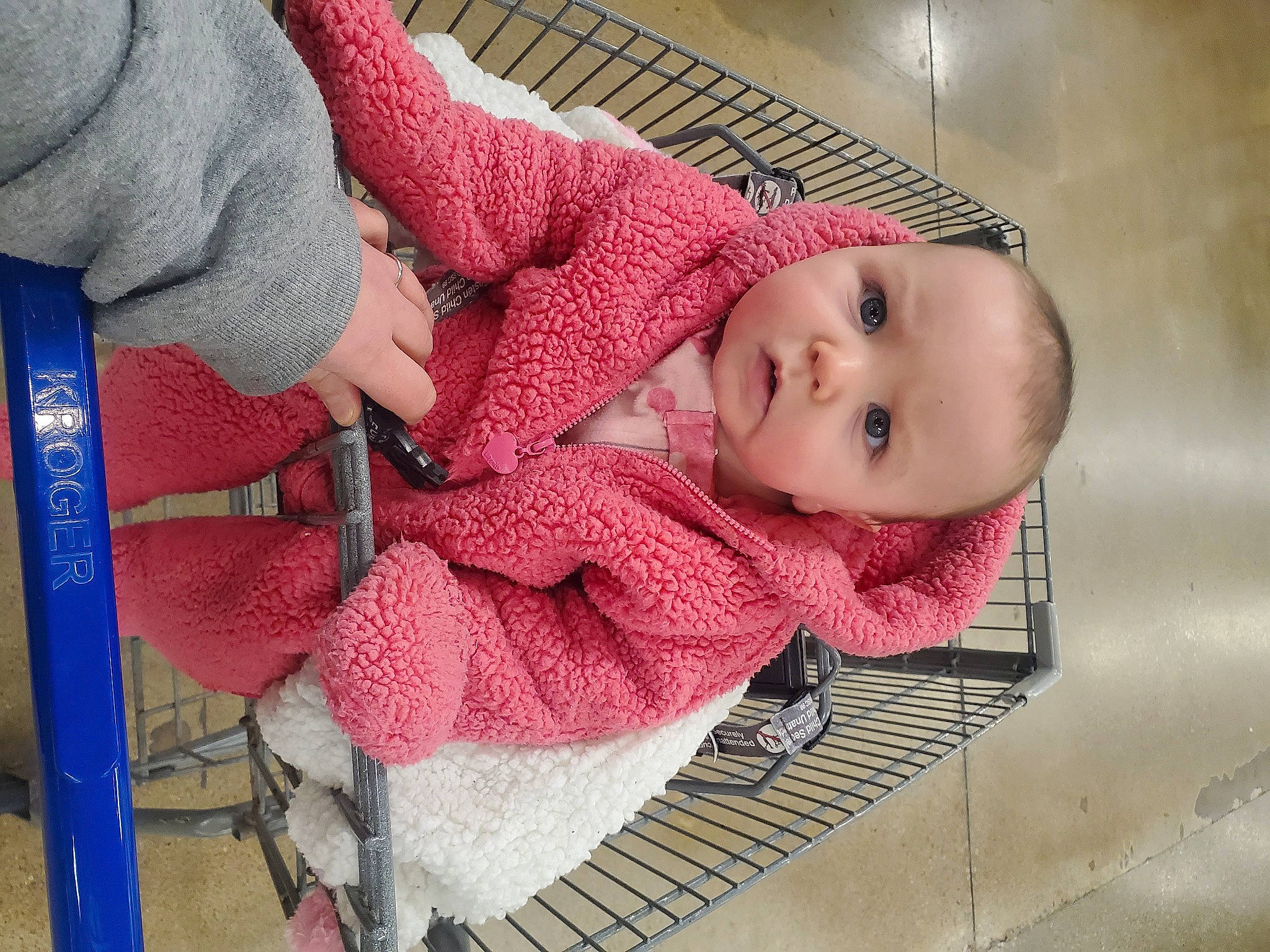 Skylee is registered to the contest to win money with this photo: baby, baby_carriage, baby_products, baby_safety, baby_toddler_clothing, chair, cheek, child, comfort, flooring, lap, linens, pattern, person, sitting, toddler, wool, woolen