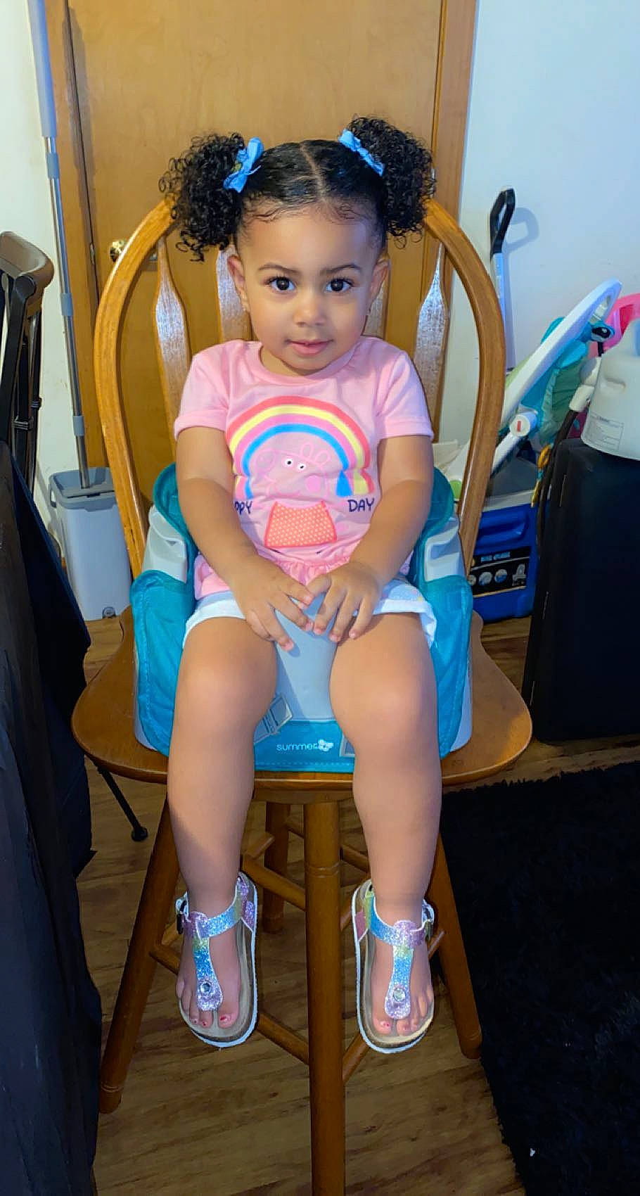 Mèlani joined the competition — help win amazing prizes! baby_toddler_clothing, blue, chair, child, electric_blue, eye, foot, fun, hair, hair_tie, happy, human_leg, knee, lap, person, sandal, shorts, sitting, skin, thigh