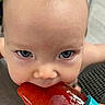 toddler, child, face, blue_eyes, popsicle, red_popsicle, food, summer, close_up, skin, hand, expression, innocence, snack, refreshment, happy, cute, portrait, sweet, outdoor