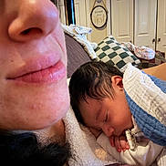 Madison joined the competition — help win amazing prizes! newborn, baby, sleeping, blanket, face, closeup, person, adult, skin, lips, hair, hand, indoor, couch, pillow, comfort, rest, cozy, family, home