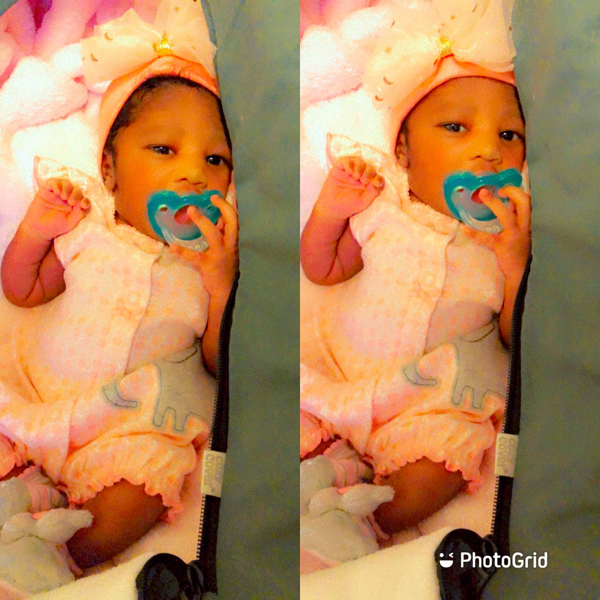 Kimora is registered to the contest to win money with this photo: arm, baby, baby_toddler_clothing, cheek, chin, comfort, eyebrow, eyelash, facial_expression, finger, gesture, hand, headwear, iris, lip, mouth, nose, person, product, skin