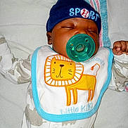 Jerzey joined the competition — help win amazing prizes! baby, bib, blanket, child, closeup, cute, hat, infant, lion, onesie, pacifier, peaceful, portrait, resting, sleeping, sleepwear, soft, striped, wearing, young