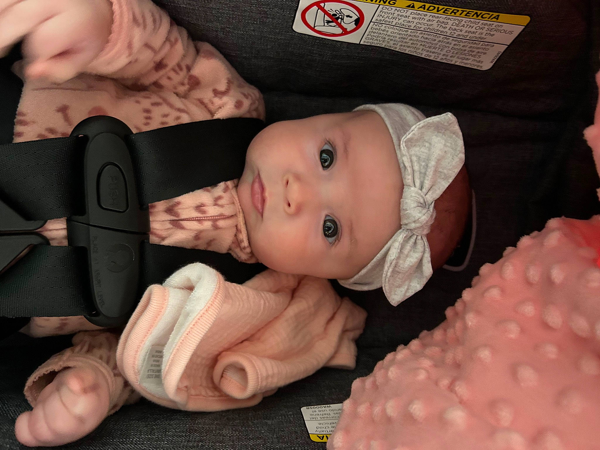 Maelynn is registered to the contest to win money with this photo: baby, baby_products, baby_toddler_clothing, cheek, child, comfort, finger, gesture, hand, headwear, mouth, nail, pattern, peach, person, pink, product, skin, thumb, toddler
