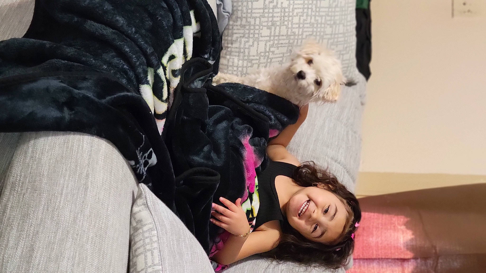 Zamorra joined the competition — help win amazing prizes! black_hair, child, comfort, companion_dog, dog, dog_breed, flash_photography, fun, fur, happy, human, joy, mammal, person, room, sitting, smile, stuffed_toy, textile, toy