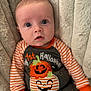 Stetson joined the competition — help win amazing prizes! baby, infant, child, halloween, pumpkin, orange, striped_clothing, cute, soft_blanket, portrait, costume, festive, holiday, smiling_pumpkin, sleepwear, young_child, face, eyes, hands, cozy