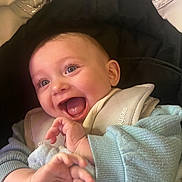 Rico joined the competition — help win amazing prizes! baby, babywear, blanket, child, closeup, clothing, cozy, cute, expression, face, hands, happy, indoor, infant, portrait, seat, smiling, soft, warm, young