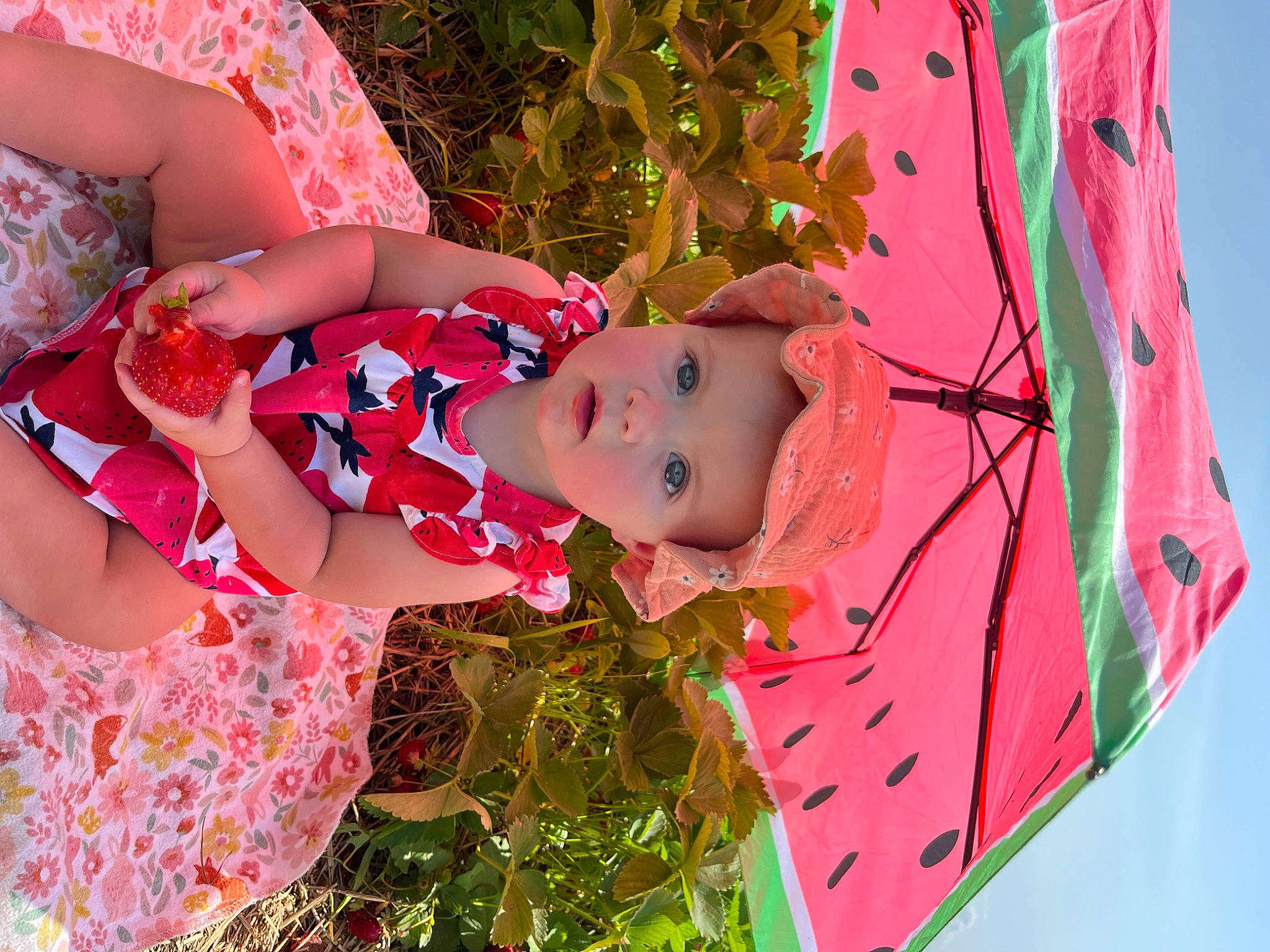 Alena is registered to the contest to win money with this photo: child, day_dress, event, facial_expression, fashion, fun, grass, green, happy, headwear, magenta, orange, pattern, peach, people_in_nature, person, pink, plant, red, smile