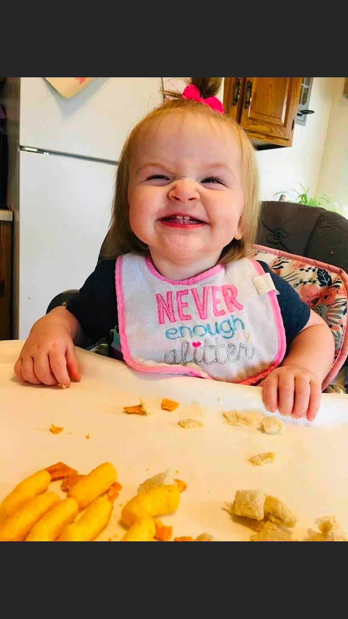 Emerlynn is registered to the contest to win money with this photo: baking, child, comfort_food, cuisine, dish, eating, food, joy, junk_food, kids_meal, person, play, toddler