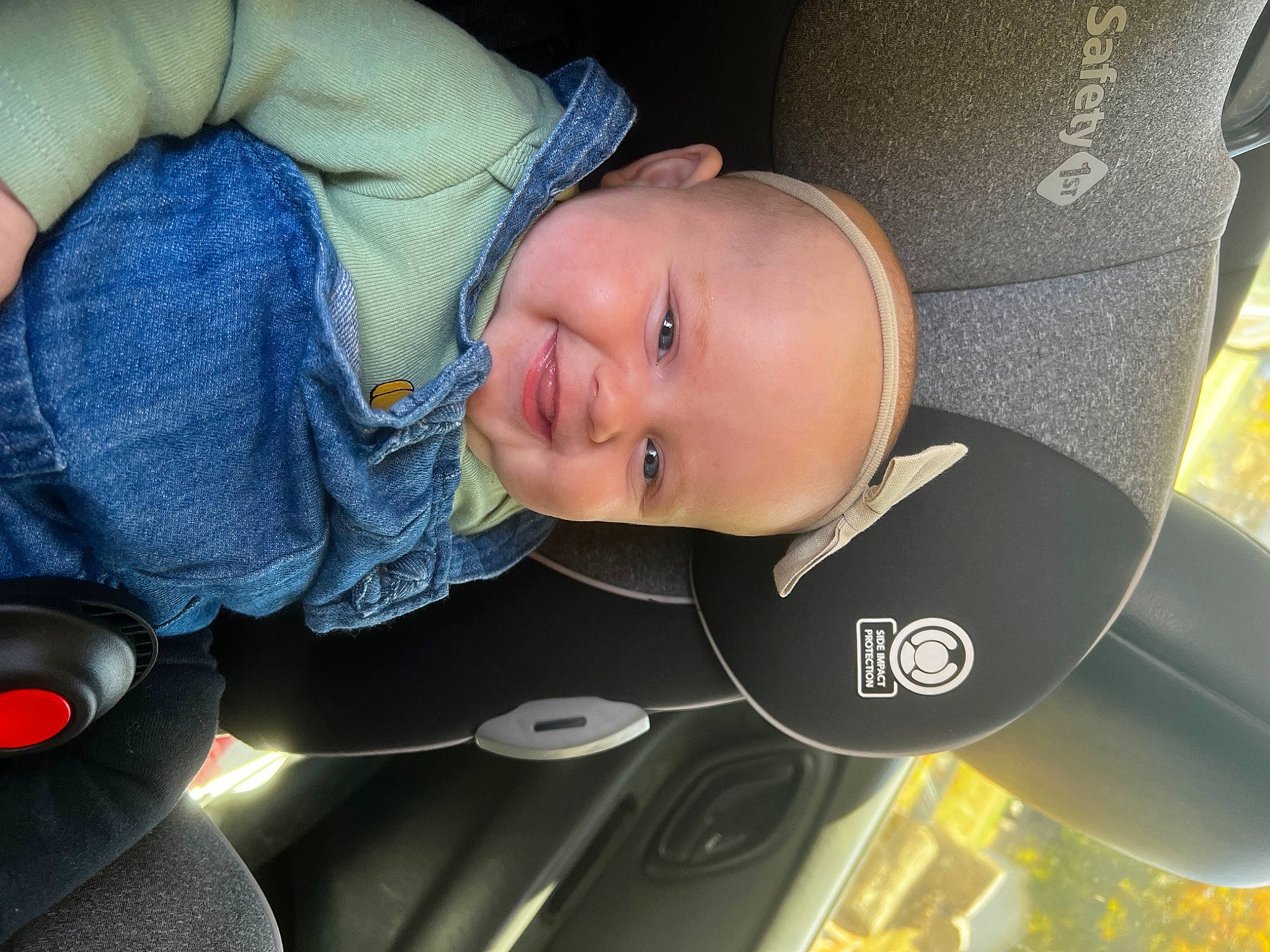 Laken is registered to the contest to win money with this photo: auto_part, automotive_exterior, baby, baby_products, car_seat, car_seat_cover, child, comfort, elbow, fun, joy, luxury_vehicle, person, sitting, smile, toddler, vehicle_door