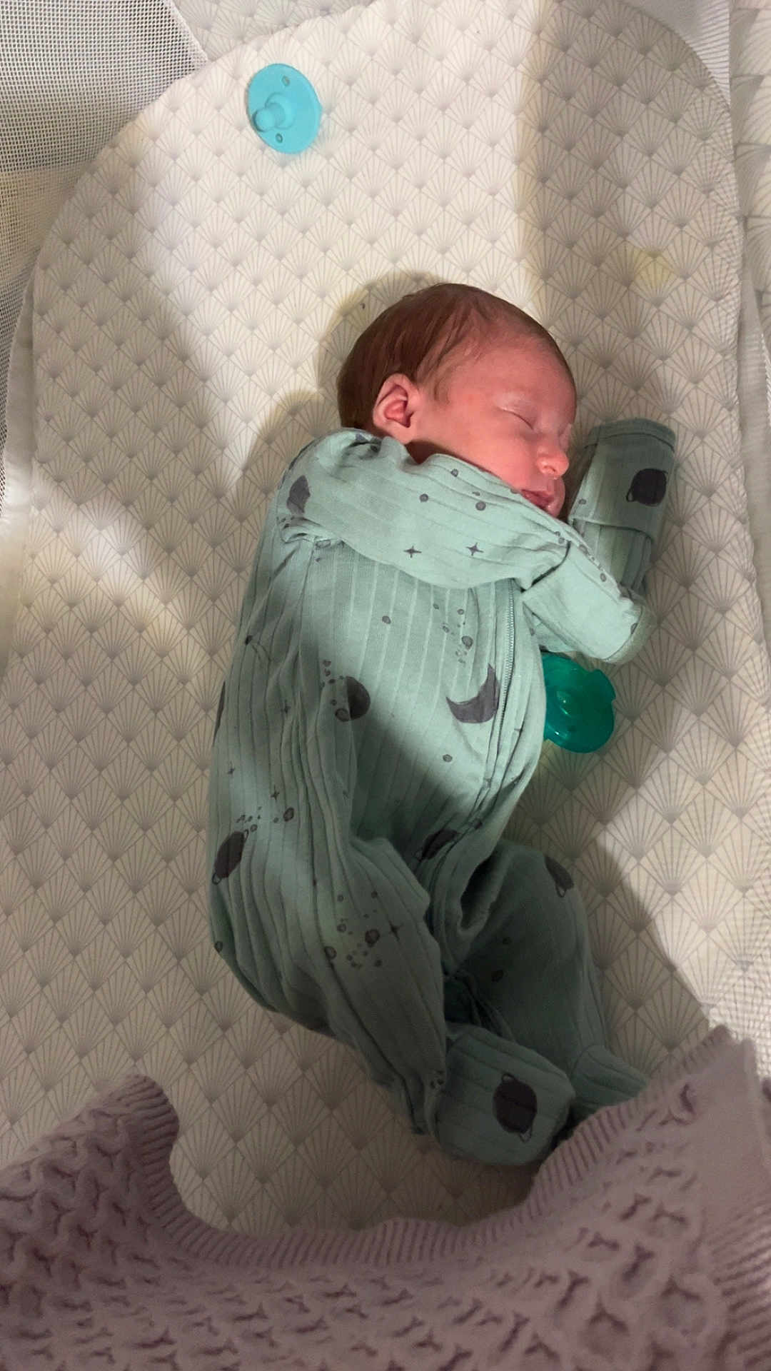 Sylvia joined the competition — help win amazing prizes! newborn, baby, sleeping, onesie, pacifier, bassinet, blanket, infant, cozy, patterned, soft, resting, cute, child, peaceful, indoors, bedtime, sleep, nursery, clothing