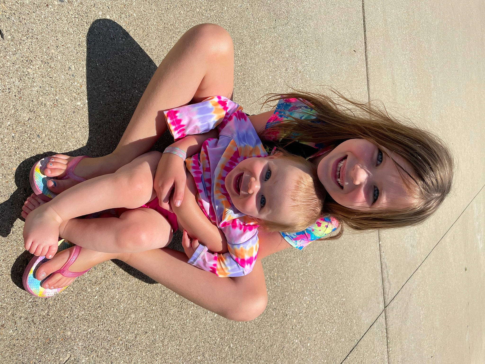 Renae joined the competition — help win amazing prizes! barefoot, eyewear, foot, fun, grass, happy, human_body, human_leg, joint, joy, knee, leg, leisure, magenta, pattern, people_in_nature, person, pink, smile, swimwear