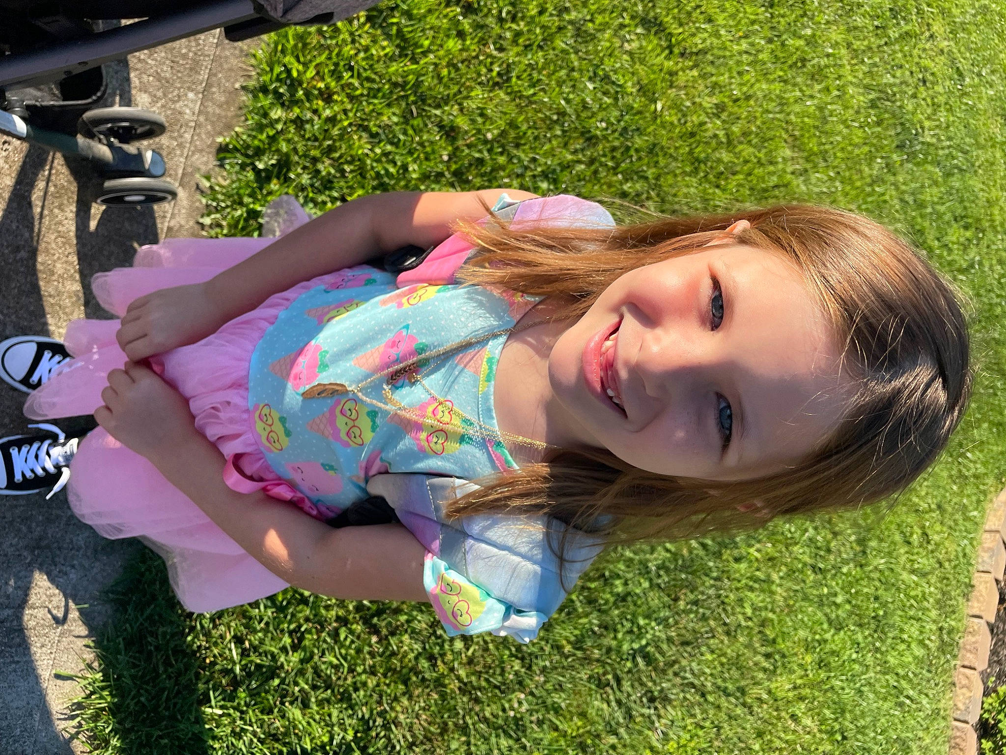 Renae is registered to the contest to win money with this photo: beauty, child, cool, fun, grass, grassland, happy, human_leg, joy, lawn, leisure, people_in_nature, person, plant, portrait_photography, recreation, sitting, smile, thigh, tree