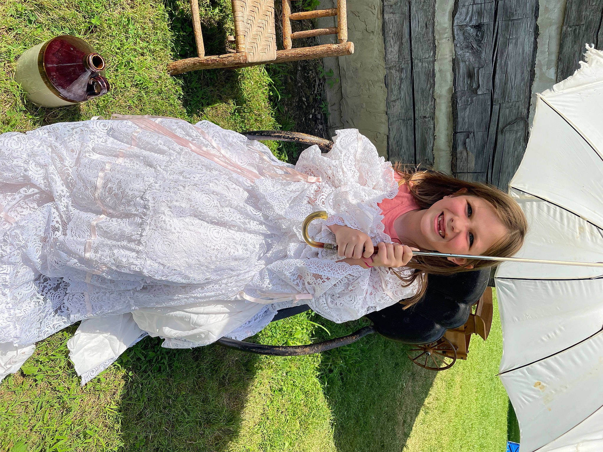 Renae joined the competition — help win amazing prizes! backyard, bridal_accessory, bridal_clothing, ceremony, chair, child, dress, event, fun, garden, grass, happy, joy, leisure, people_in_nature, person, plant, sitting, smile, tree