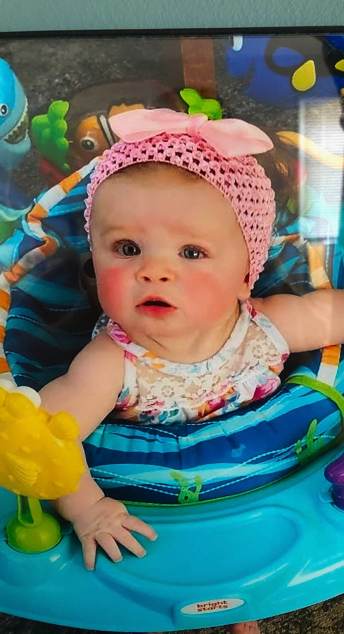 Finley is registered to the contest to win money with this photo: baby, baby_toddler_clothing, beauty, blue, cap, cheek, child, facial_expression, fun, green, happy, leisure, people, person, photograph, pink, purple, skin, snapshot, toddler